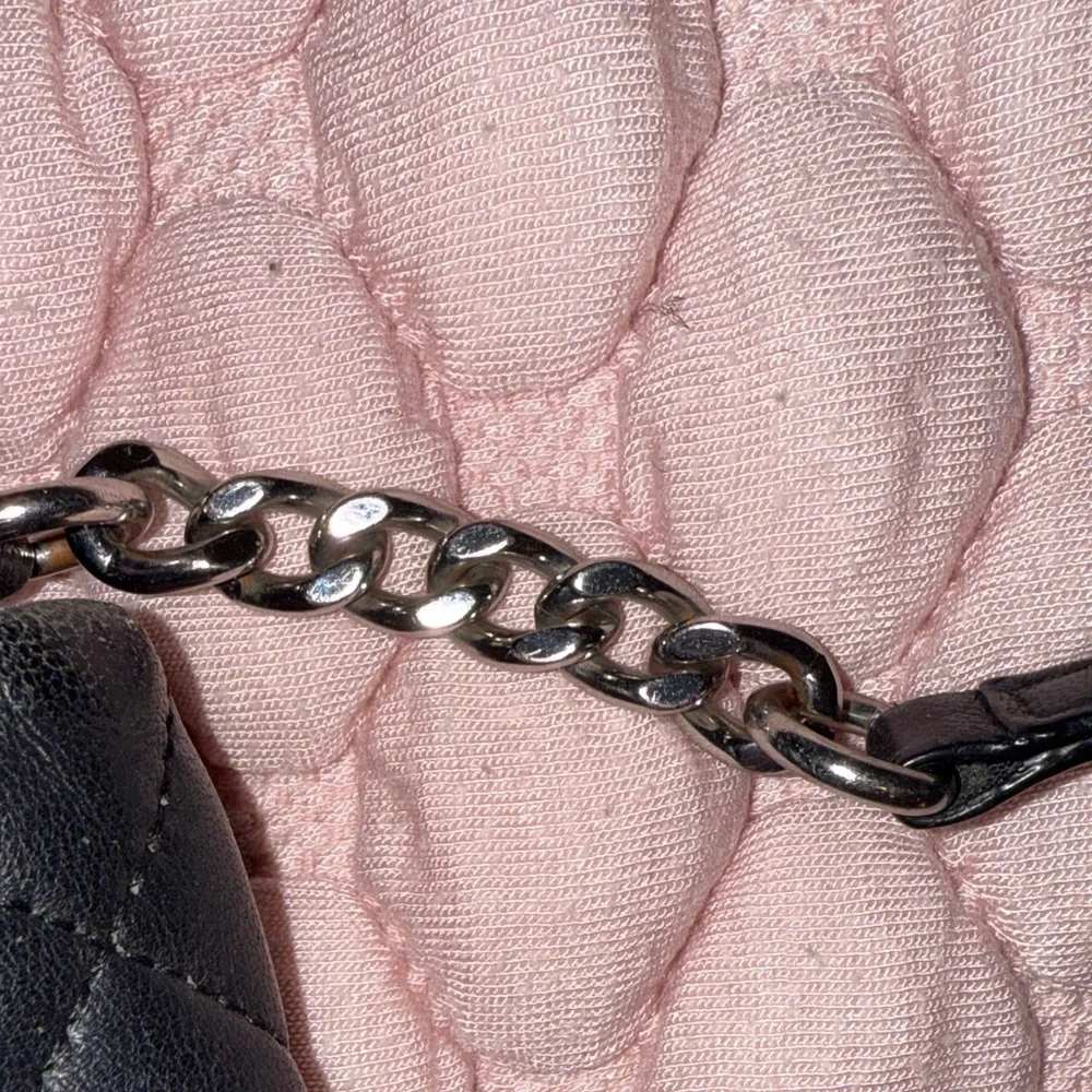 Calvin Klein Black Quilted Crossbody Bag with Silver Accents